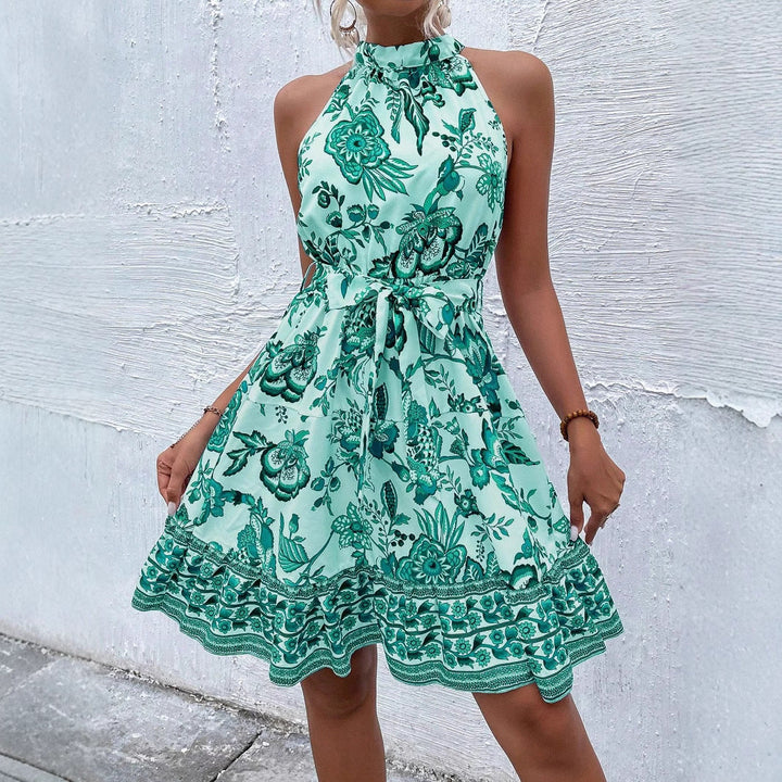 Vestido midi halter para mujer con cinturón ajustable, ideal para verano y ocasiones elegantes. Moda femenina chic.