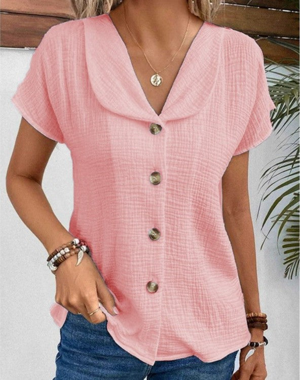 Blusa con cuello y botones, diseño moderno y sofisticado para mujer. Una pieza clave de moda casual y elegante.