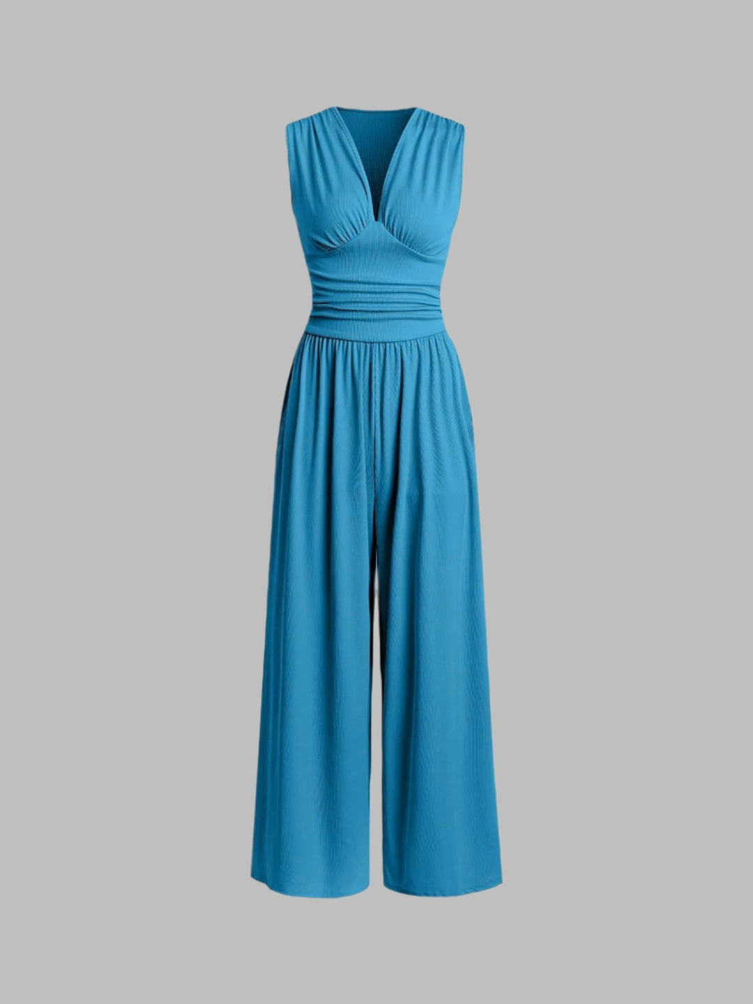 Ropa de fiesta: mono fluido para mujer con escote V y pantalón ancho. Estilo elegante y moderno.
