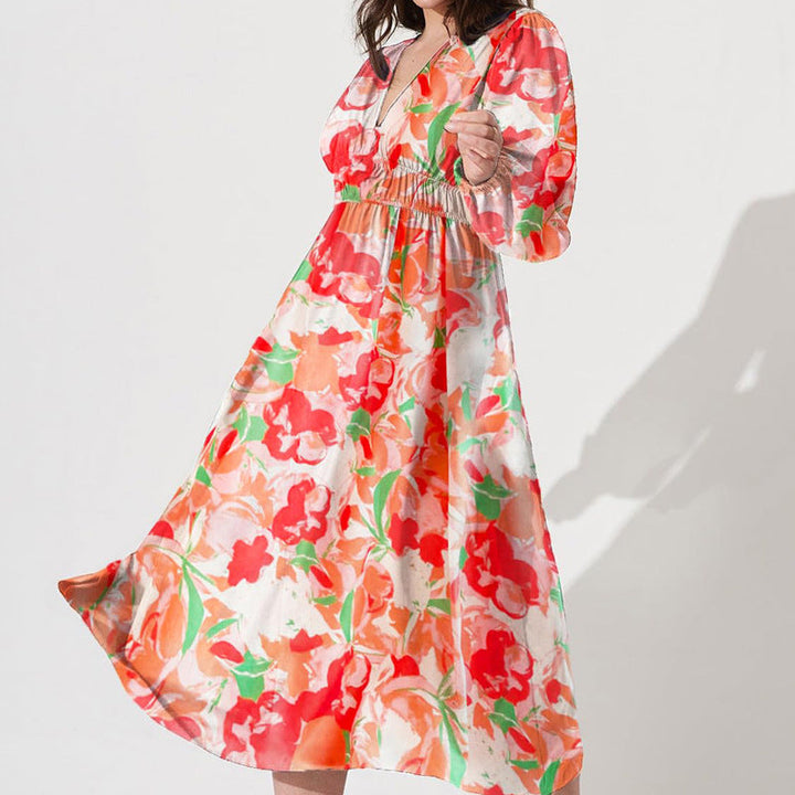 Vestido femenino con estampado floral. Escote cruzado, vuelo y largo midi. Look de verano.