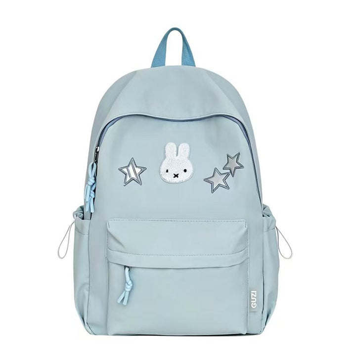 Mochila universitaria casual con personaje bordado de conejo, ideal para estudiantes.