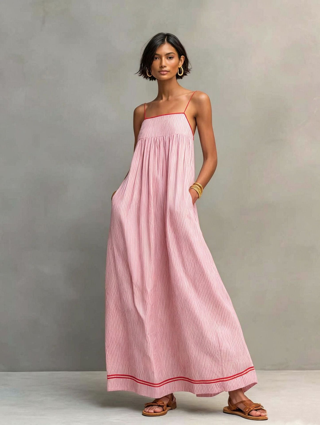Vestido largo de mujer con estampado de rayas finas, diseño cómodo y veraniego, perfecto para el día a día.