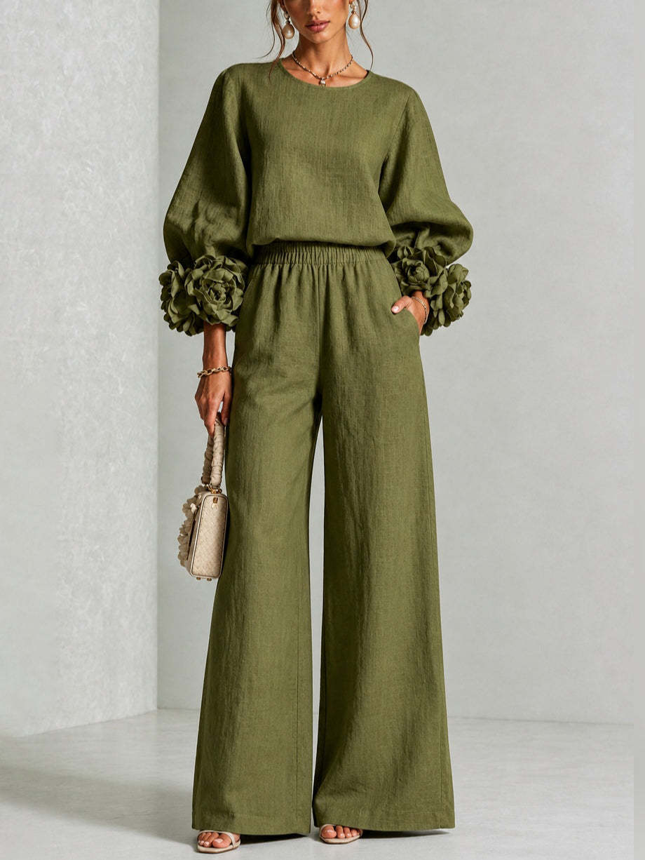 Conjunto casual de verano para mujer, blusa con vibrante estampado floral y pantalón ancho elegante y cómodo.