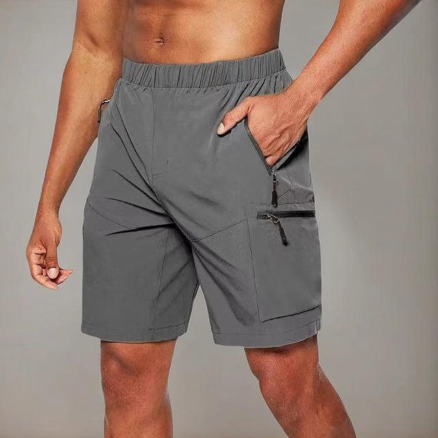 Short deportivo hombre negro con bolsillos seguros, ideal para gym, correr y fitness.