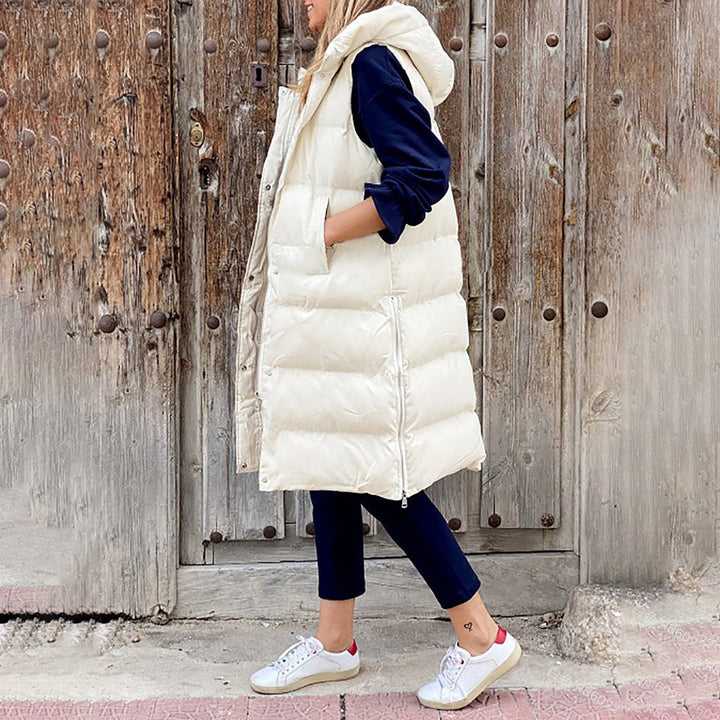 Chaleco largo y abrigado para mujer. Con capucha, sin mangas, perfecto para capas en otoño/invierno.