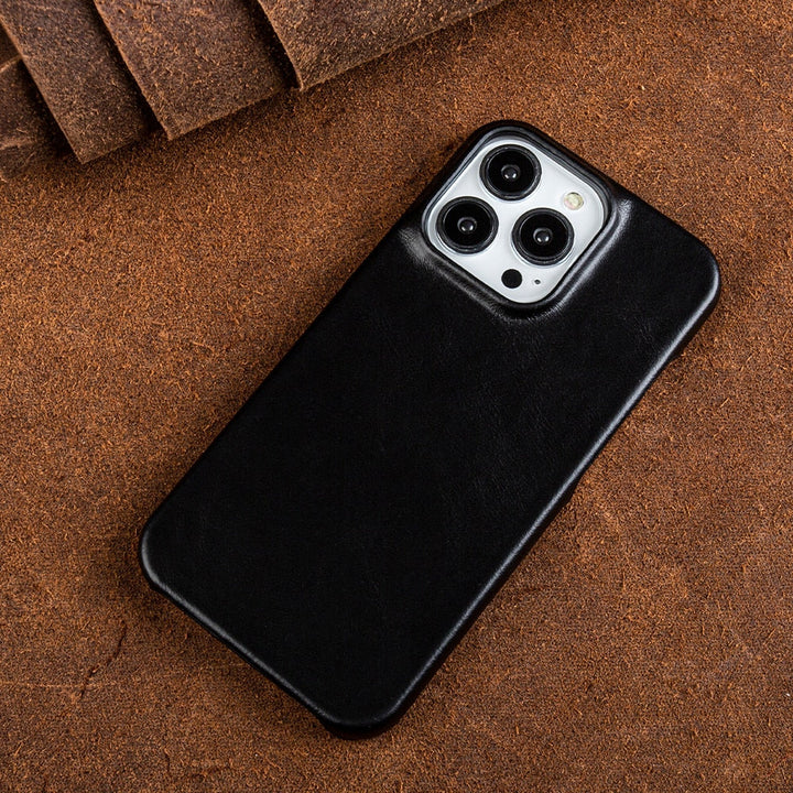 Carcasa de cuero genuino para iPhone, protección total antiarañazos y MagSafe compatible.