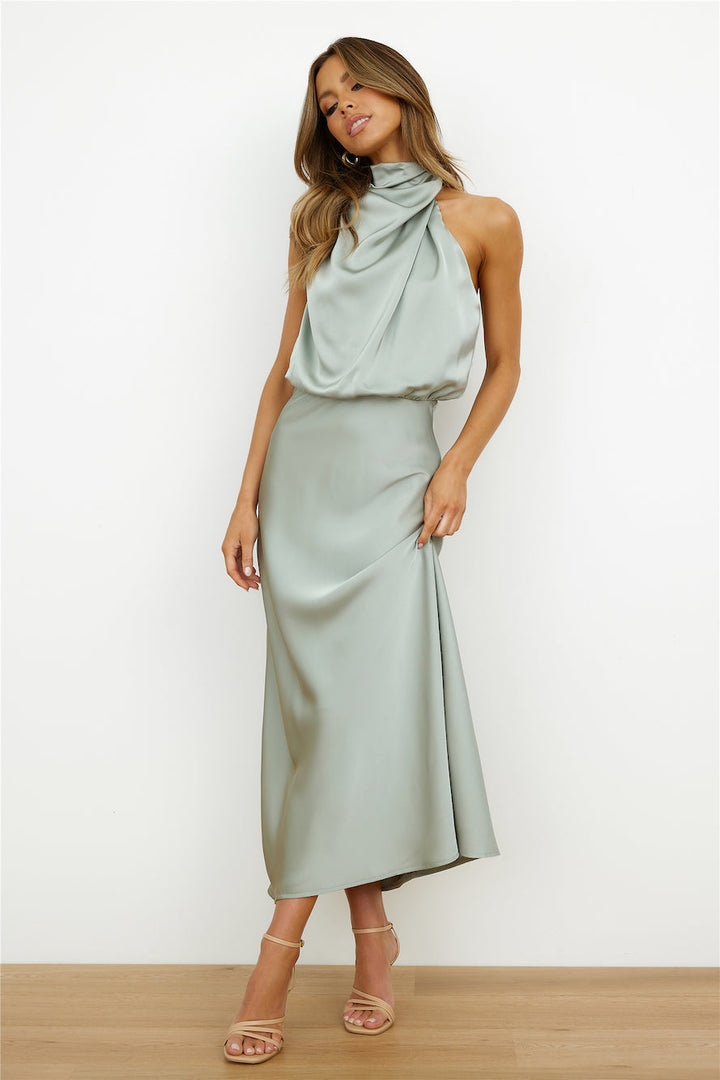 Vestido asimétrico midi Luzielle, ideal para mujer moderna. Versátil, de fiesta o para verano casual.