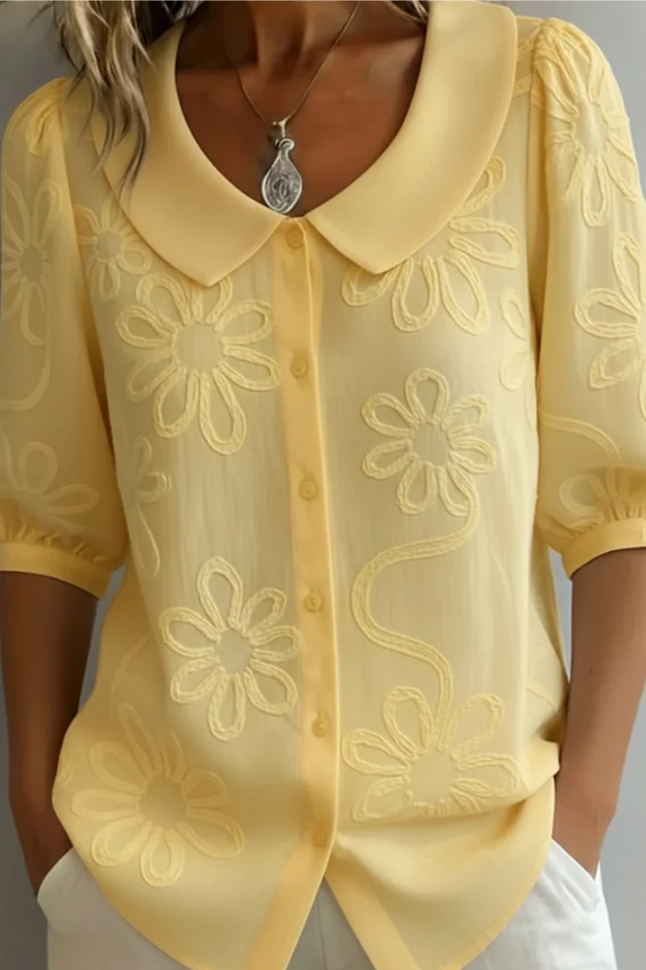 Blusa Fiora elegante para mujer, estampado floral, ideal primavera/verano, moda chic y transpirable.