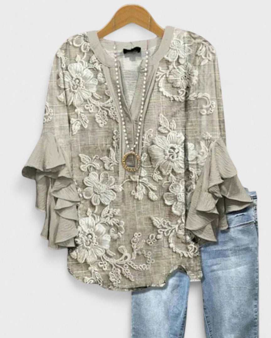 Blusa casual de mujer con volantes y estampado floral, perfecta para primavera y verano diario.