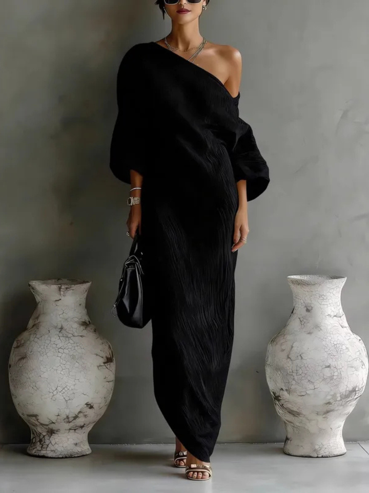 Vestido maxi negro asimétrico de un hombro. Estilo elegante y fluido para mujer, perfecto para eventos de noche.