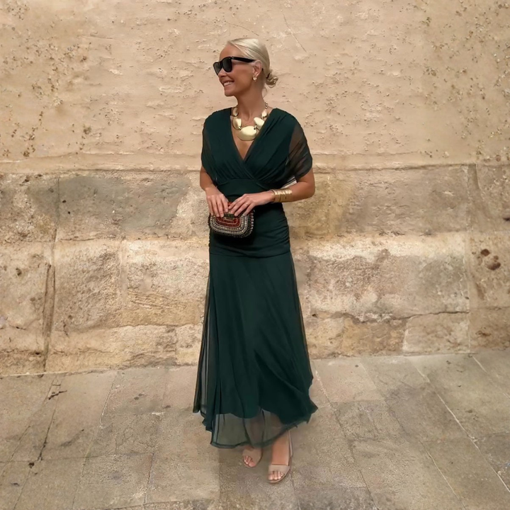 Vestido maxi de fiesta elegante para mujer, escote en V, ideal para eventos de noche y celebraciones.