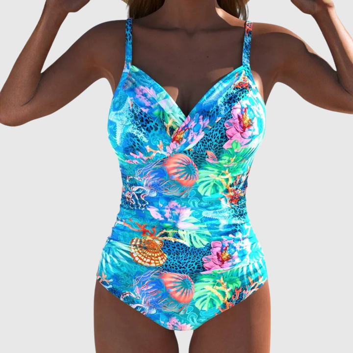 Bañador tropical de mujer, una pieza, escote V moldeador. Ideal para verano, playa y piscina.