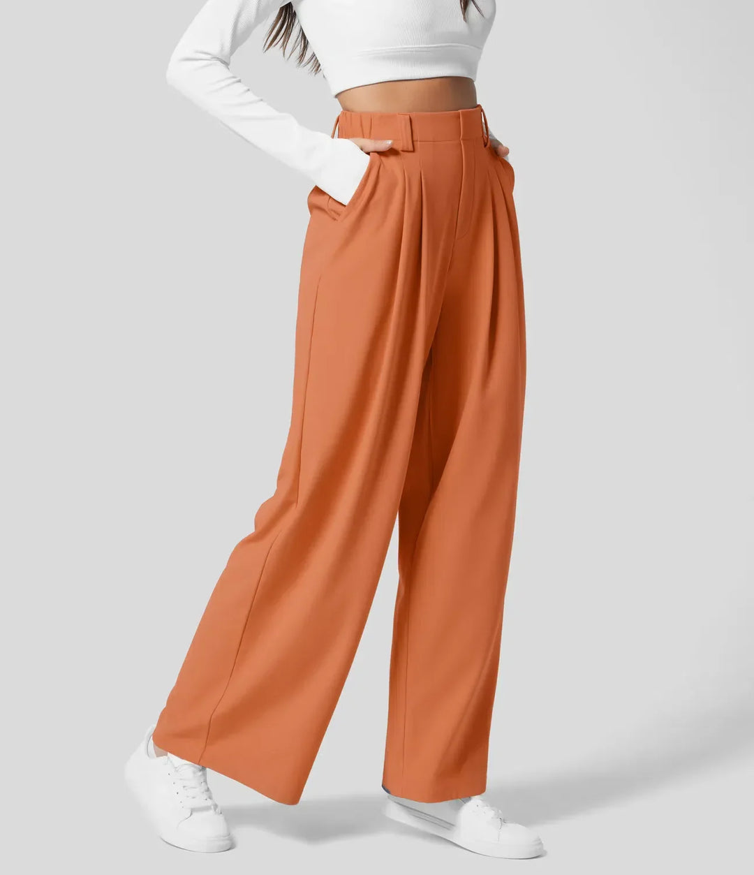 Pantalón de mujer, talle alto y pernera ancha, versátil para looks casuales y formales.