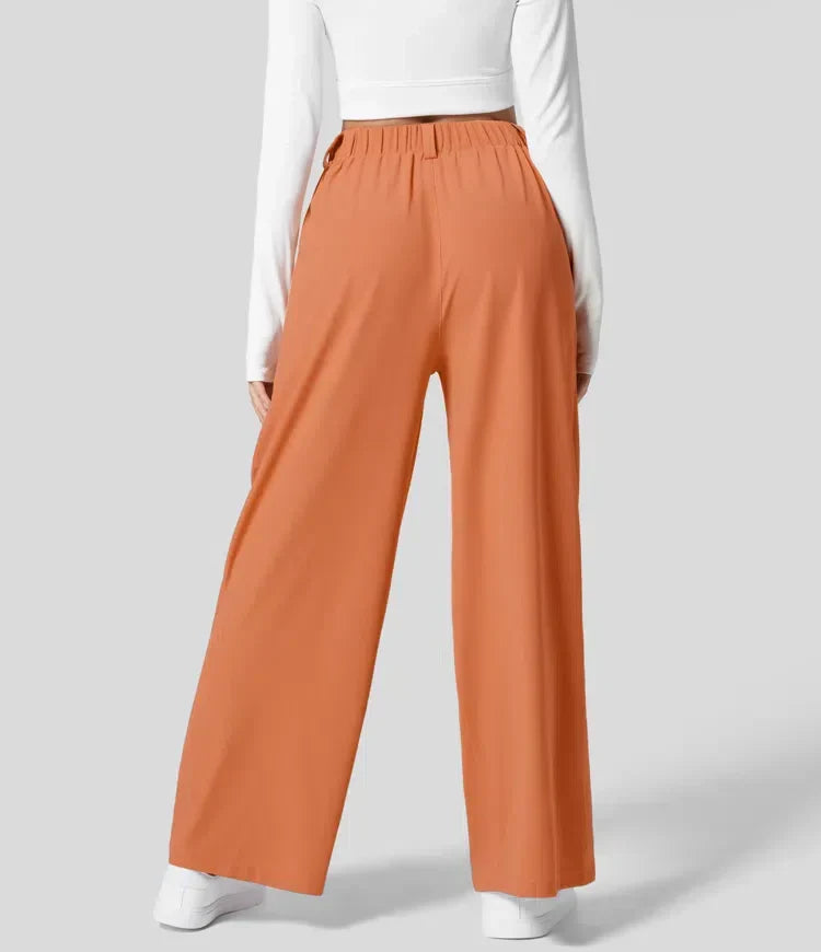 Pantalón largo de mujer con cintura alta, pernera ancha, para un estilo elegante.