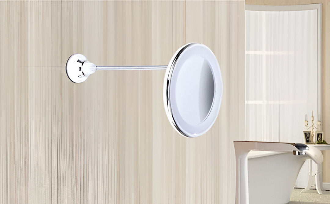 Espejo de aumento 10X con iluminación LED. Diseño portátil con ventosa para maquillaje y cuidado facial preciso.
