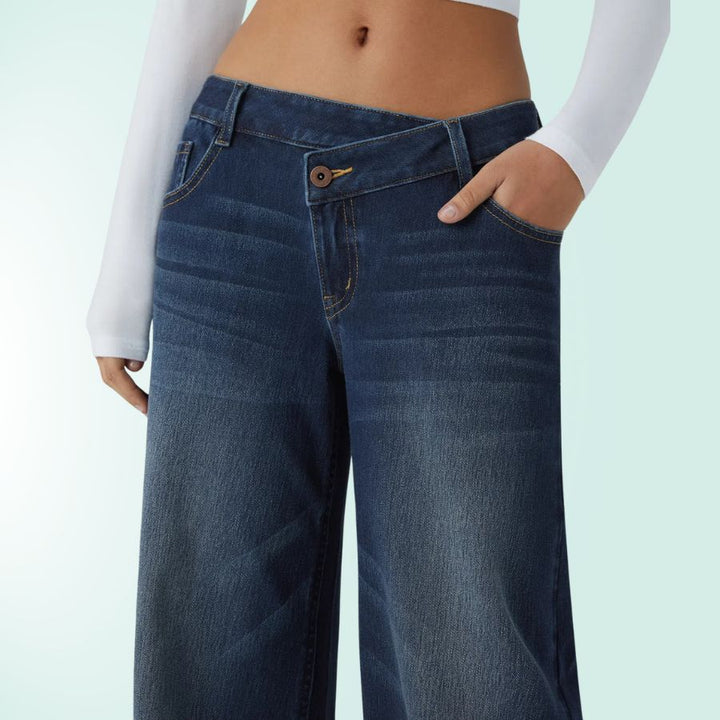 Pantalones vaqueros asimétricos, tiro bajo mujer. Elásticos, comodidad y estilo azul denim.