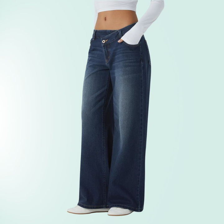 Pantalones vaqueros mujer, tiro bajo asimétrico. Elásticos, pierna ancha para estilo casual.