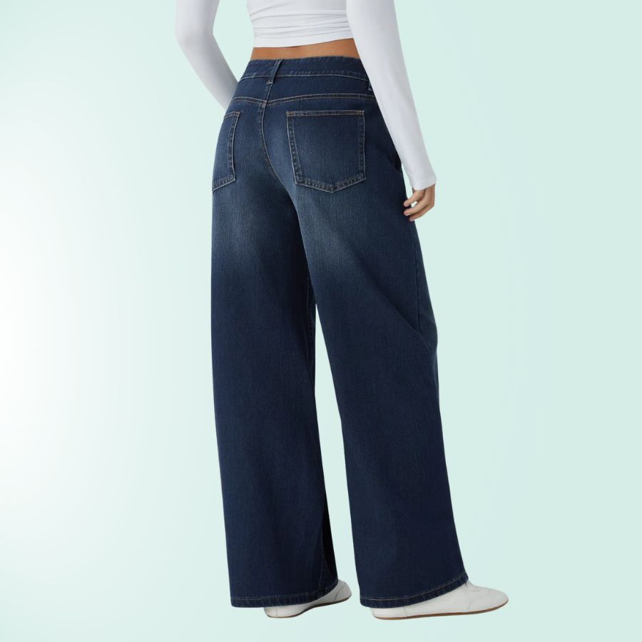 Vaqueros elásticos mujer asimétricos, tiro bajo. Comodidad y moda femenina azul denim.