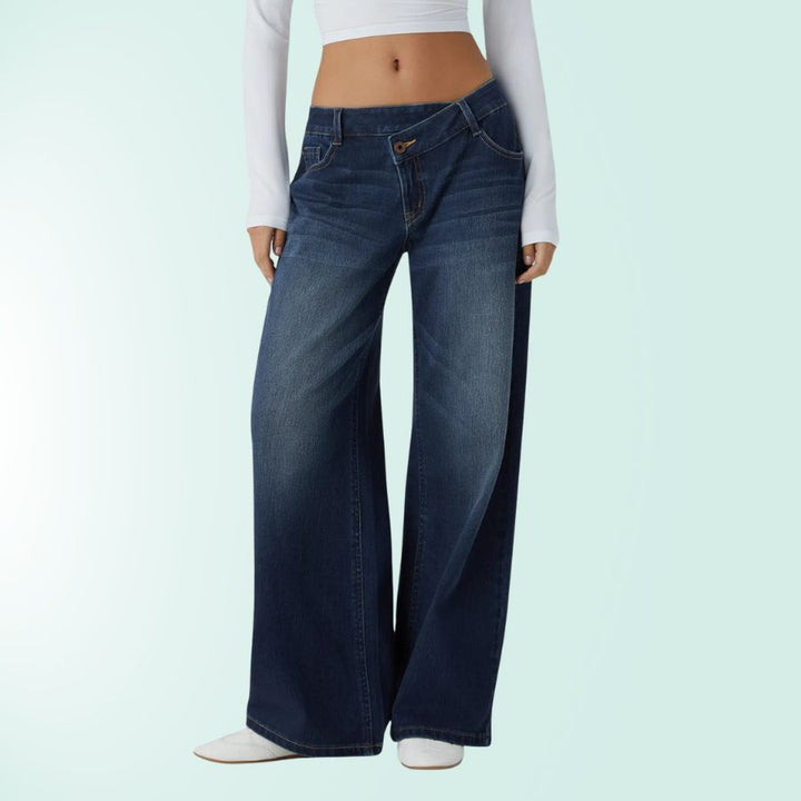 Estilo y comodidad en vaqueros mujer elásticos, tiro bajo asimétrico. Moda casual azul.