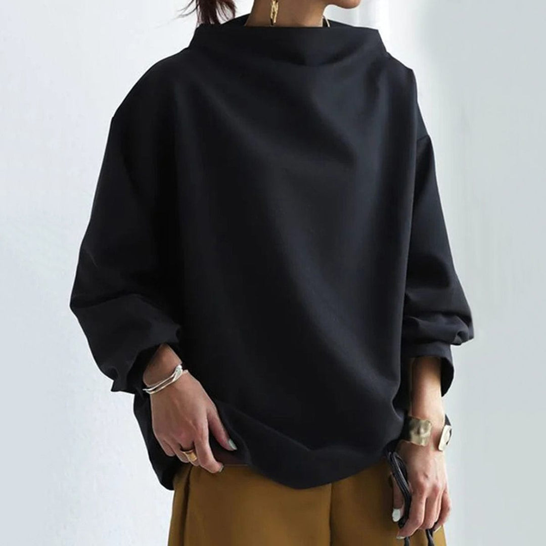 Blusa casual de mujer, cuello caja y manga larga. Estilo versátil y cómodo, ideal para outfits de otoño.