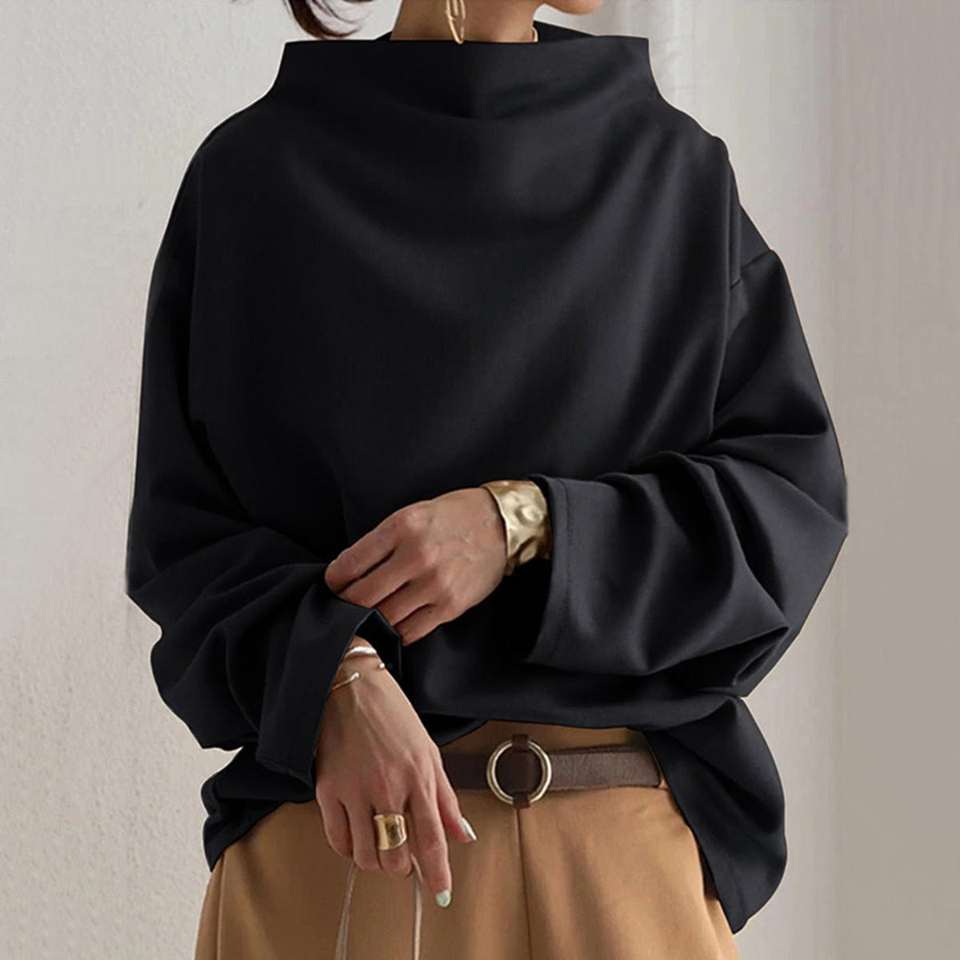 Blusa mujer cuello caja manga larga, estilo casual y cómodo. Ideal para outfit relajado de día.