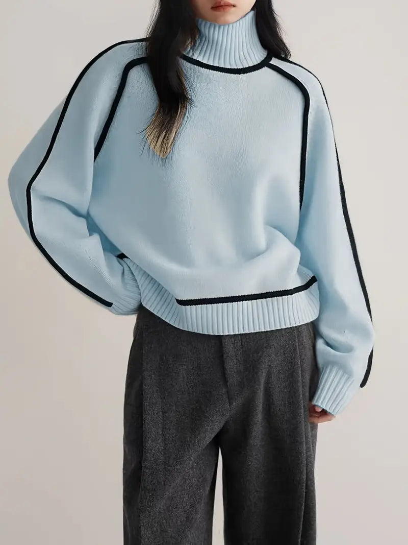 Jersey de punto cuello alto para mujer con cinturón, acentuando la cintura. Versátil y elegante para otoño/invierno.