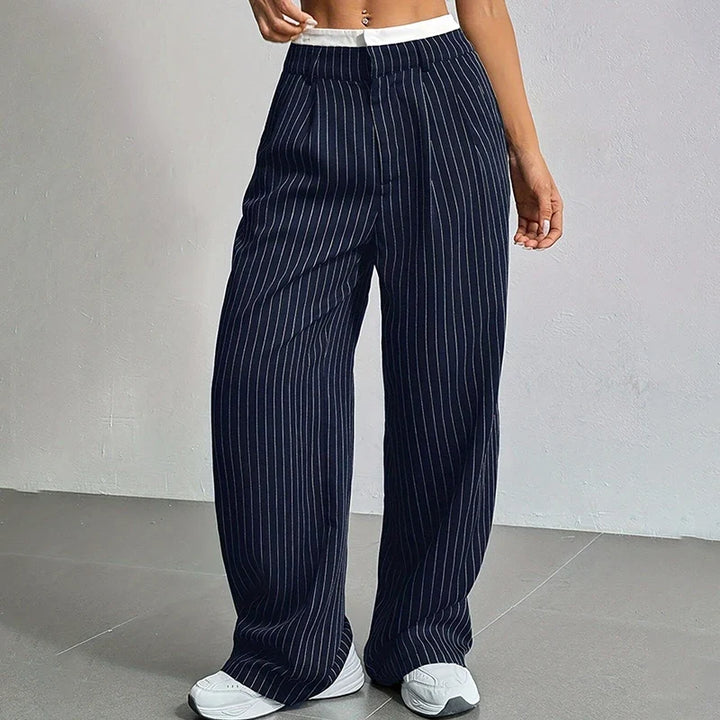 Pantalones de mujer elegantes, cintura alta y pierna ancha. Ideales para un look casual o formal con confort.