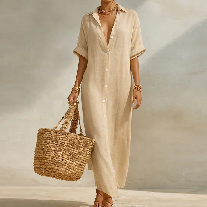 Vestido camisero maxi de rayas. Diseño versátil con botones para mujer. Ideal para looks primaverales y casuales.