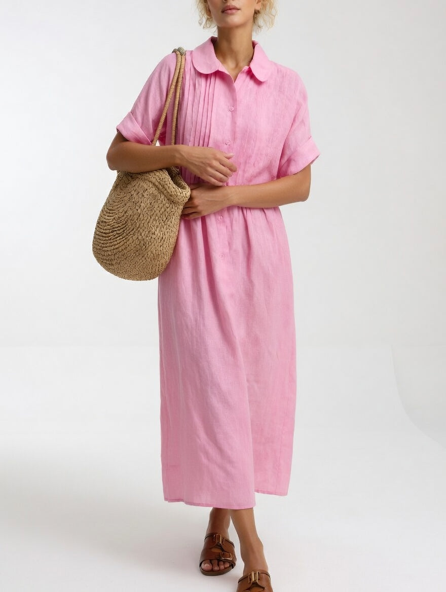 Vestido de verano fluido para mujer, con diseño camisero. Aporta elegancia casual y frescura para días de playa.