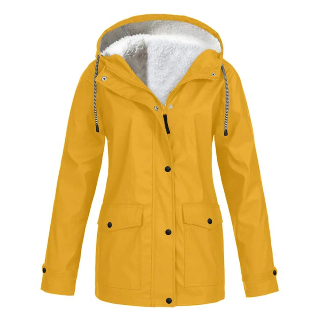 Abrigo impermeable mujer, corte medio, vista trasera. Chaqueta cálida y elegante para otoño-invierno.