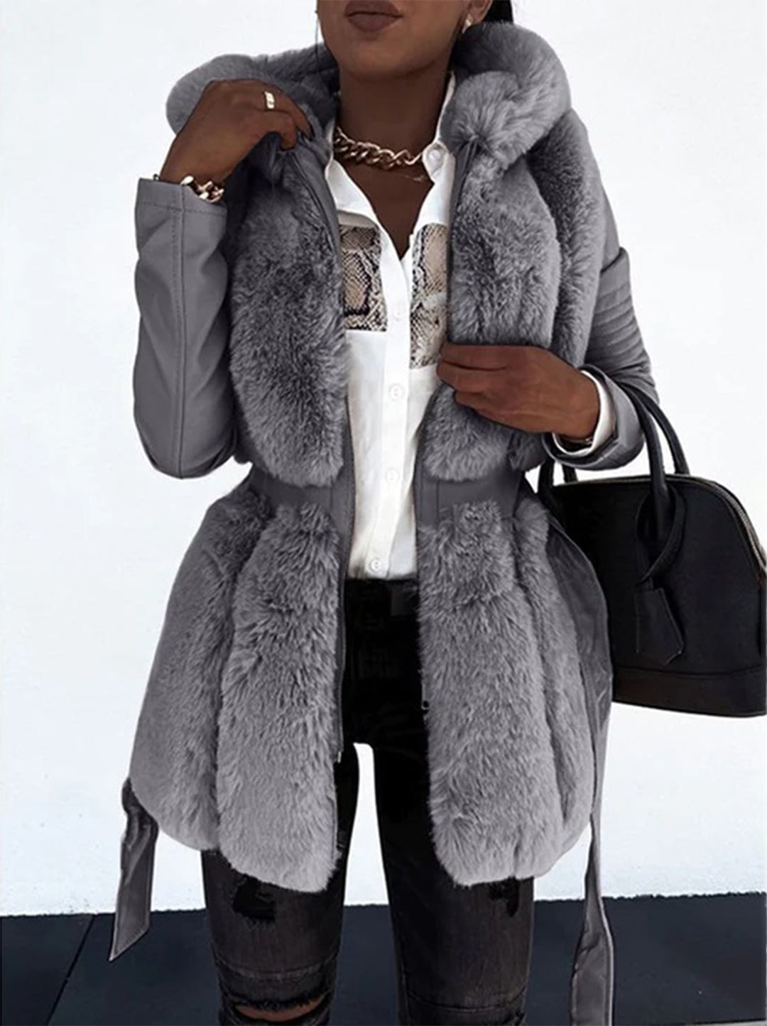 Abrigo elegante de invierno para mujer, largo medio. Cálido y con estilo para el frío.