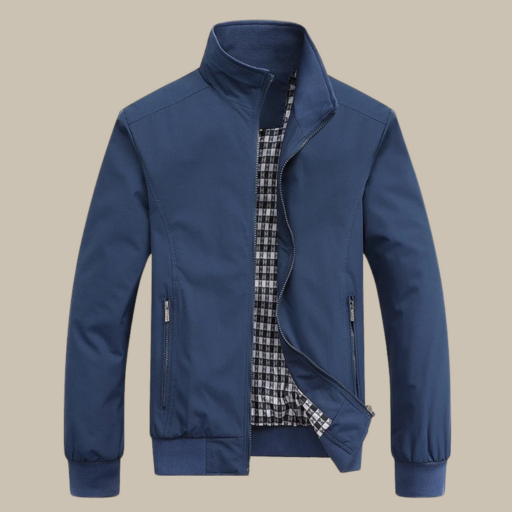 Chaqueta urbana moderna para hombre, cremallera frontal, forro a cuadros. Ideal estilo casual y entretiempo.