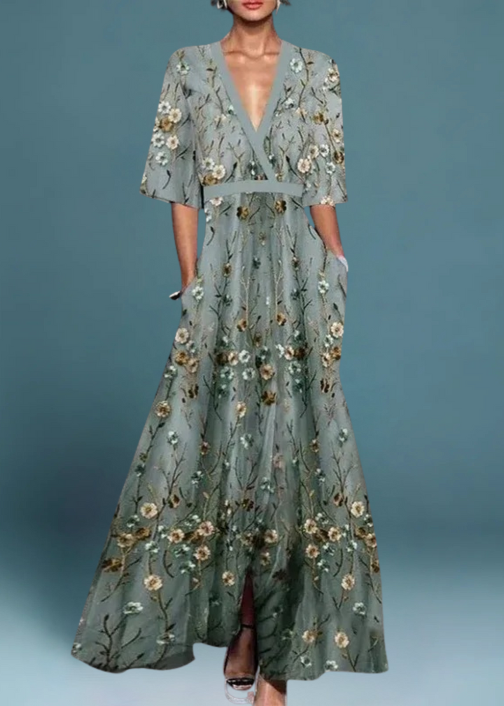 Vestido maxi floral Romi para mujer, con estampado vibrante. Elegante y cómodo, ideal para eventos de verano y fiesta.