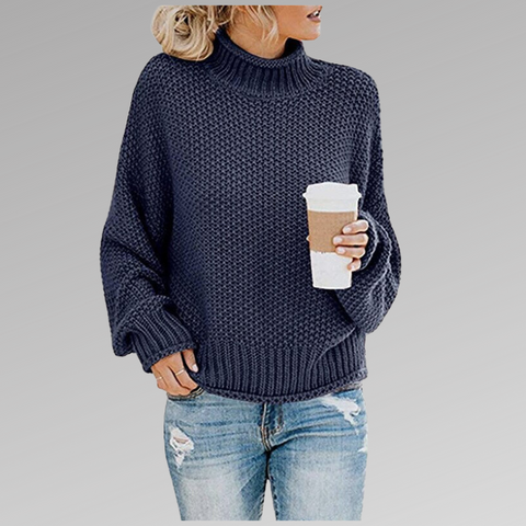 Pullover de mujer DELFINA en punto suave estructurado, cuello alto. Ideal para otoño invierno, confort y estilo.