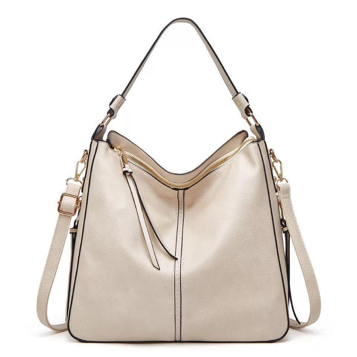 Bolso bandolera de mujer con correa ajustable y cartera de muñeca a juego, piel sintética.