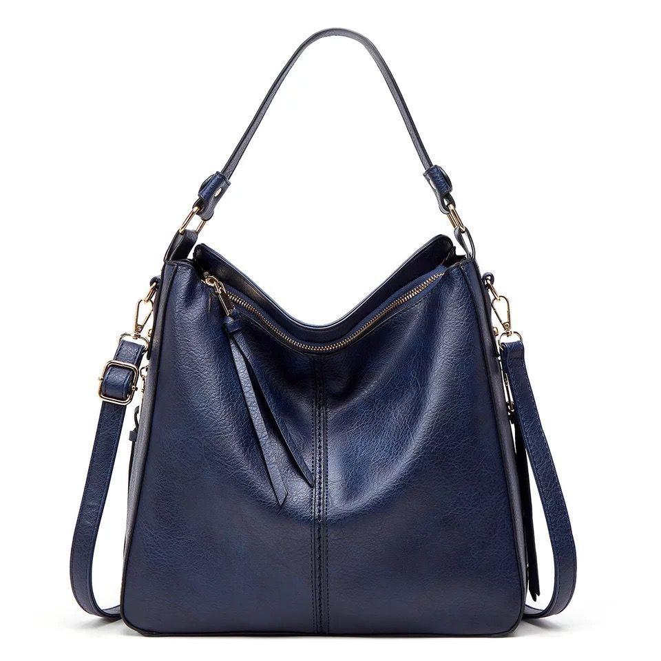 Complemento perfecto: set de bolso bandolera y minibolso de piel sintética para mujer, moda actual.