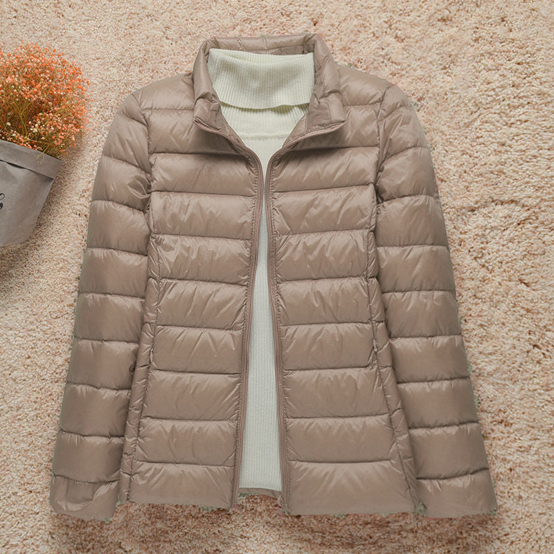 Elegante chaqueta acolchada Quinn para mujer, abrigo de invierno casual con capucha y cremallera.