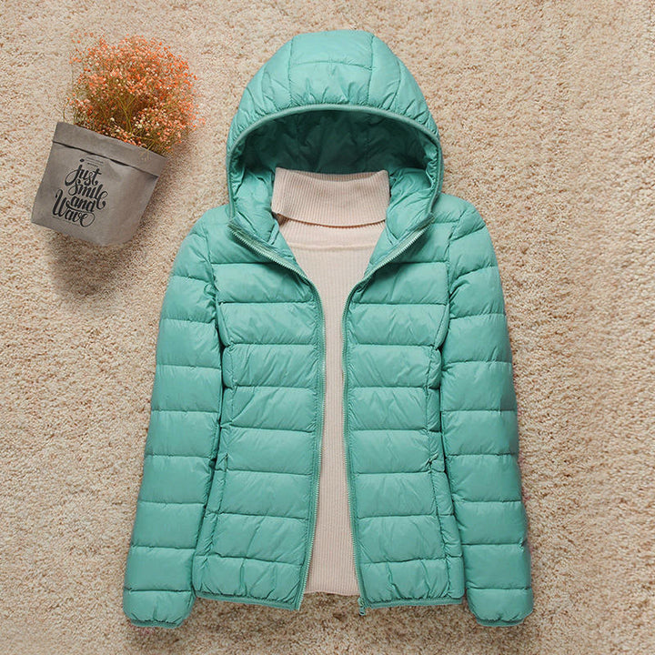 Abrigo acolchado Quinn con capucha para mujer, cuello alto y cremallera, moda invernal.