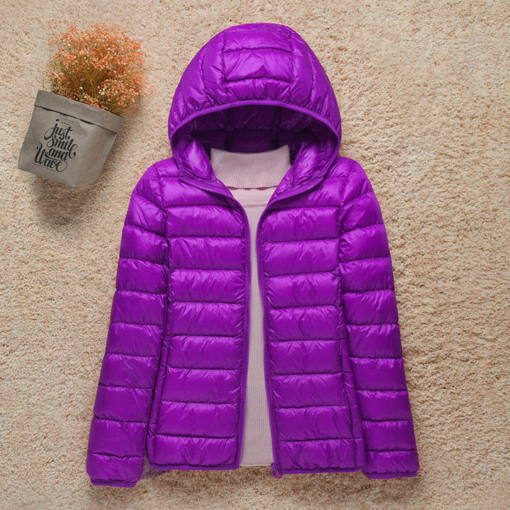 Chaqueta acolchada de invierno Quinn para mujer, casual y versátil, con capucha para mayor protección.