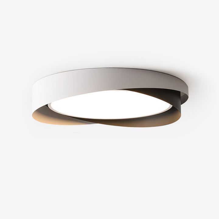 Luminaria LED negra de techo, redonda, con luz cálida para salón moderno.