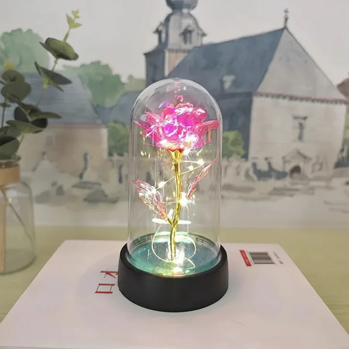 Rosa LED "eterna" bajo cúpula de cristal: lámpara de mesa romántica para una decoración duradera y bella.