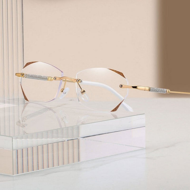 Gafas oftálmicas sin montura para mujer en plata. Lentes progresivas bloquean luz azul para lectura cómoda.