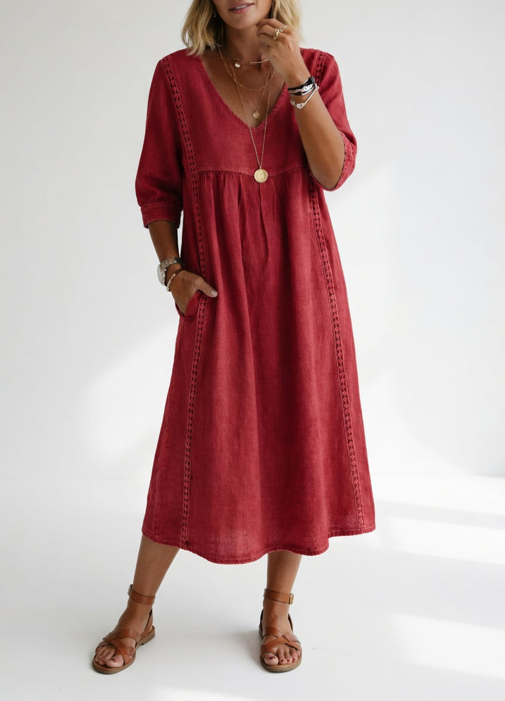 Modelo luciendo vestido midi fluido casual y elegante, perfecto para primavera y verano.