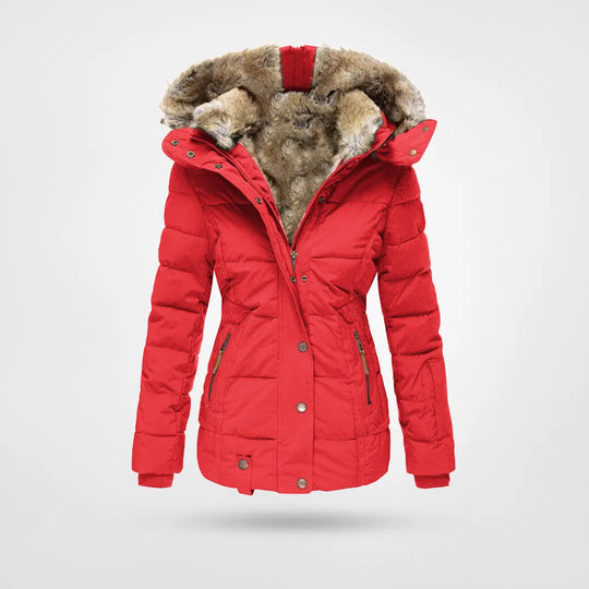 Detalle de tejido acolchado en abrigo de invierno para mujer. Su diseño aporta calidez y tendencia.
