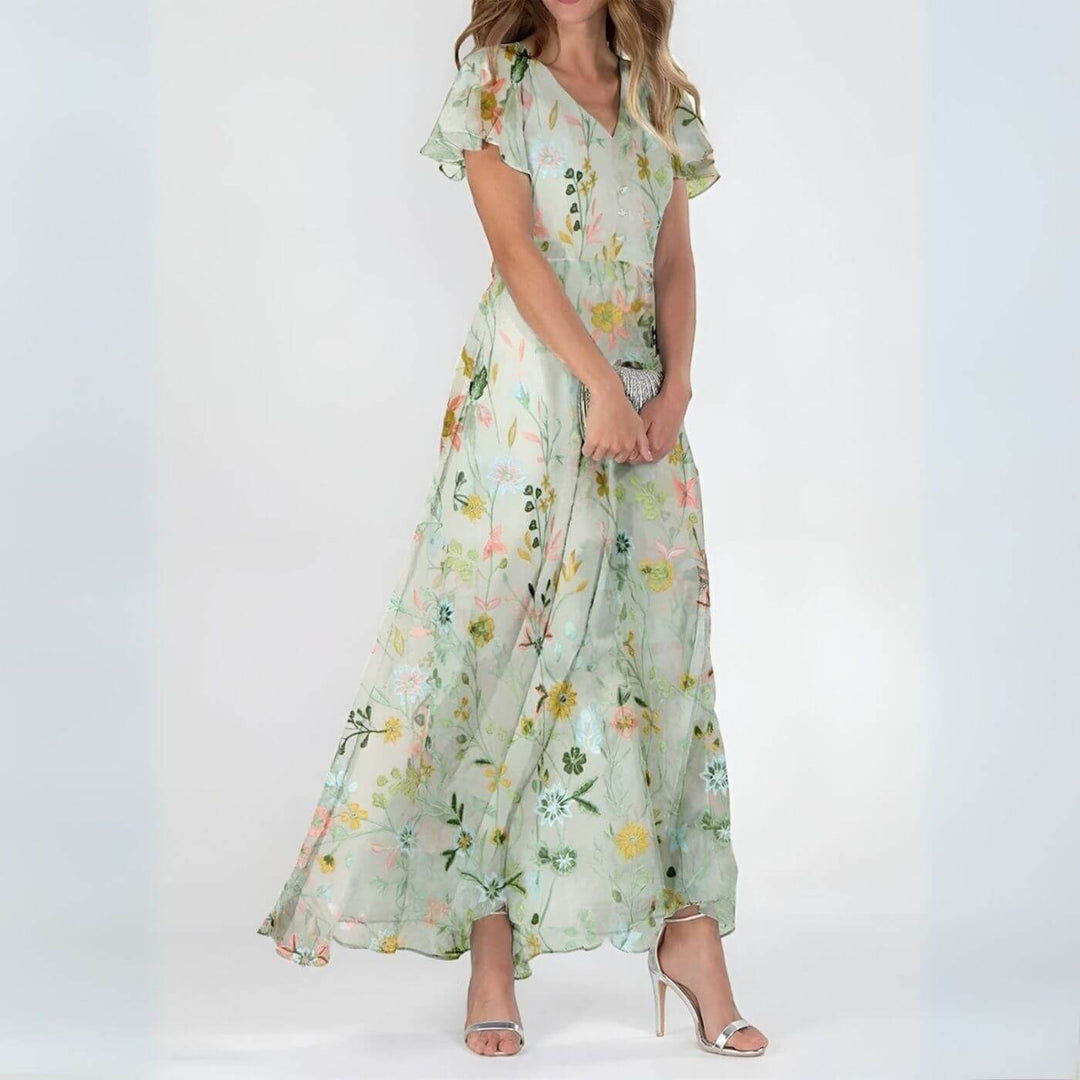 Vestido maxi de mujer estampado floral, escote en V. Estilo fluido y elegante, perfecto para playa, fiesta o vacaciones.