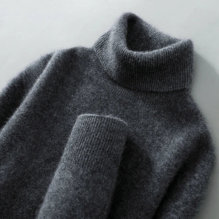 Jersey de lana mujer cuello alto, relaxed fit, prenda cómoda y versátil para invierno y otoño.