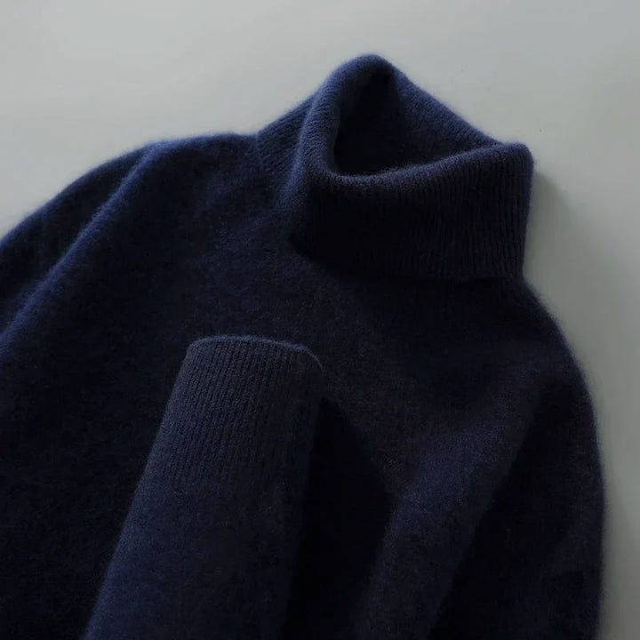 Jersey de mujer para invierno, lana cálida, cuello alto, relaxed fit, estilo casual y moderno.
