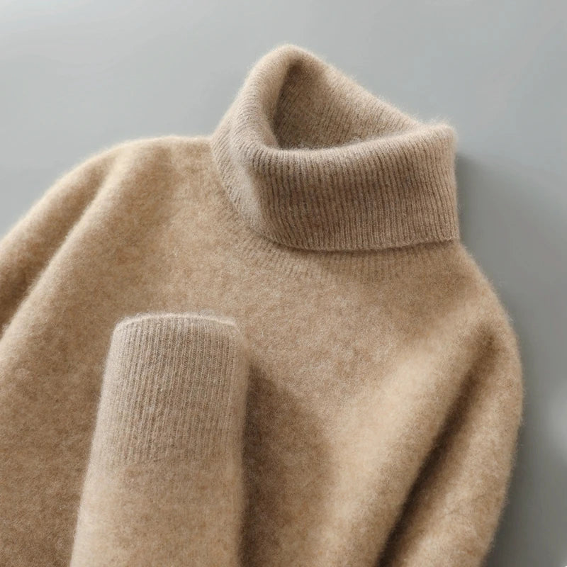 Jersey de lana de mujer, cuello alto y relaxed fit, perfecto para looks casuales de invierno.