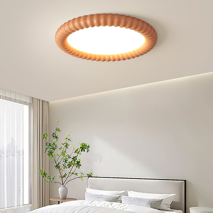 Moderna lámpara de techo LED ondulada, ahorro energía, luz tricolor, perfecta para decoración.
