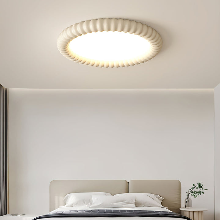 Elegante lámpara de techo LED ondulada, ideal para decoración moderna y un toque minimalista en el hogar.